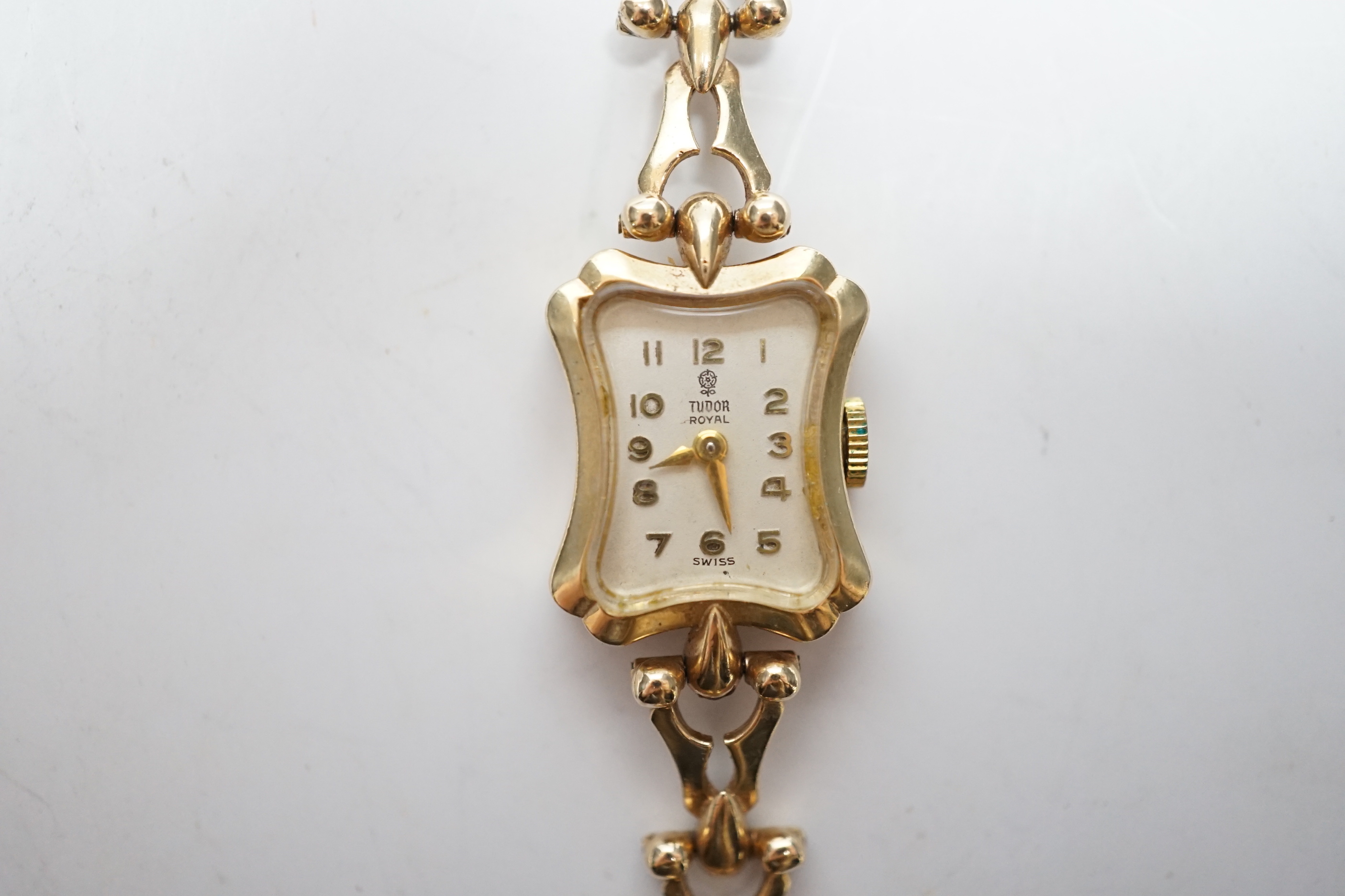 A lady's late 1960's 9ct gold Tudor Royal manual wind wrist watch, on an associated 9ct gold bracelet, overall 18cm, gross weight 18.6 grams.